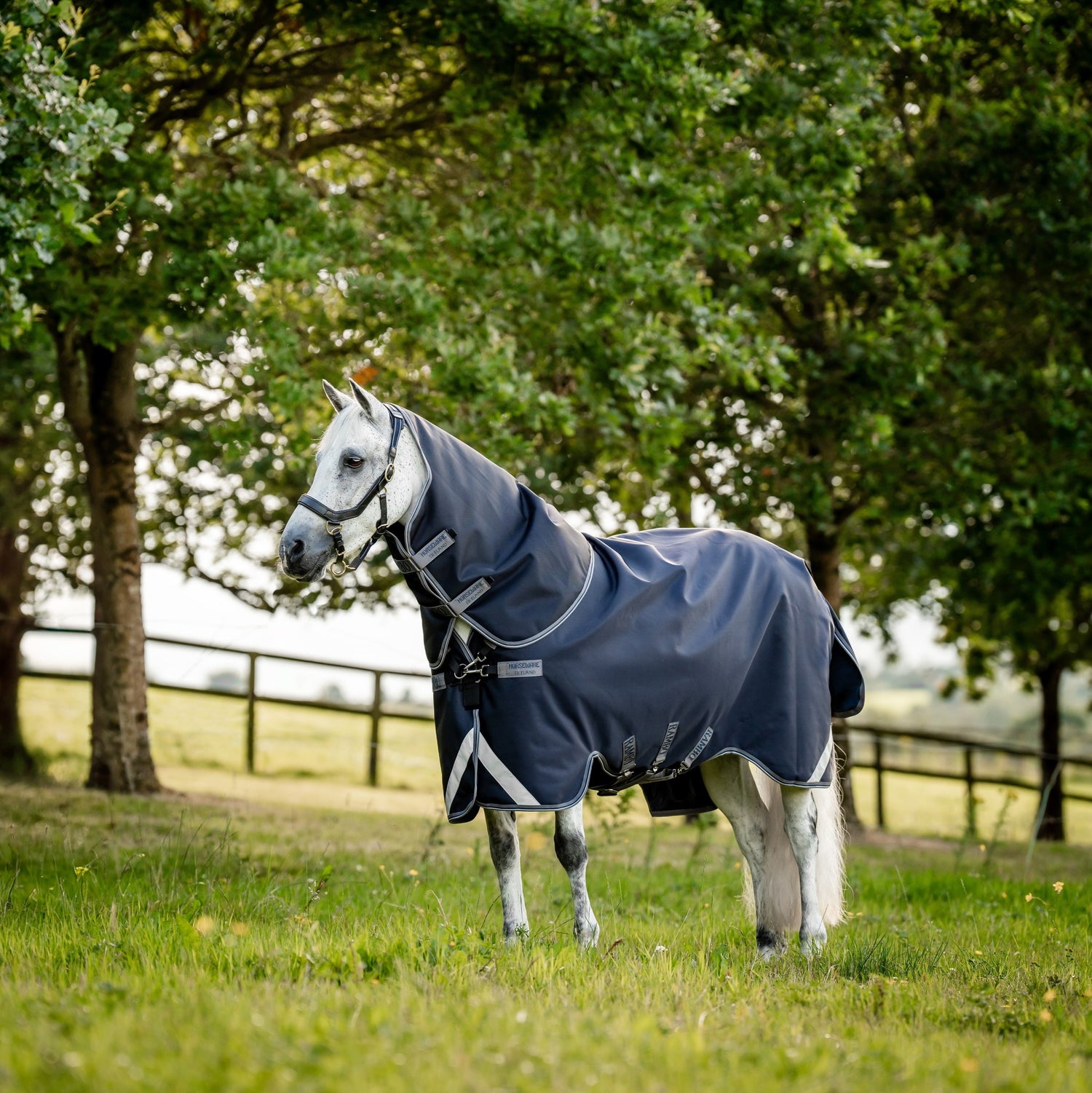 Horseware Ireland Rambo Supreme 1680D Turnout Vari-Layer 450g #colour_navy-thunderstorm-grey-silver